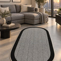 Geometric Modern Oval Kitchen Rug – Gray in a living room