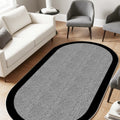 Geometric Modern Oval Kitchen Rug – Gray in a living room
