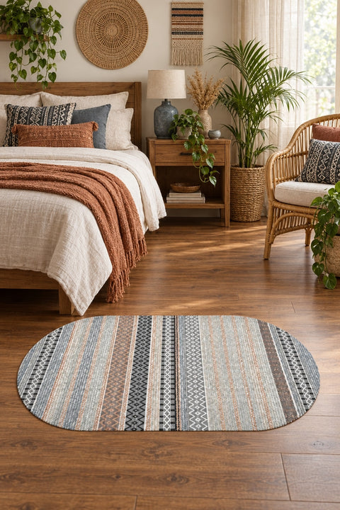 Geometric Oval Kitchen Rug – Gray in a bedroom