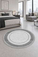 Geometric Printed Round Kitchen Rug – Gray in a bedroom