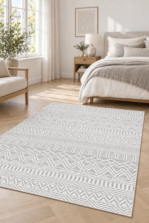 Geometric Scandinavian Area Rug – Gray in a bedroom