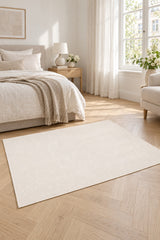 Jute Geometric Modern Area Rug – Cream in a bedroom