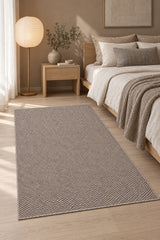 Jute Geometric Modern Area Rug – Taupe in a bedroom