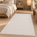 London Modern Shag Area Rug – Cream in a bedroom