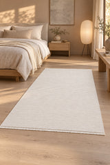 London Modern Shag Area Rug – Cream in a bedroom