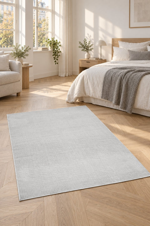 London Modern Shag Area Rug – Gray & Cream in a bedroom