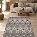 Loop Geometric Area Rug – Beige & Charcoal in a living room