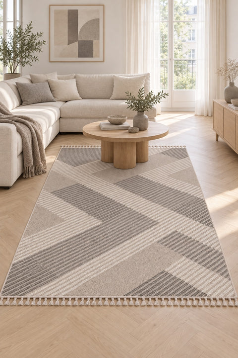 Loop Geometric Area Rug – Gray & Beige in a living room
