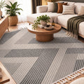 Loop Geometric Area Rug – Gray & Beige in a living room