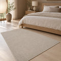 Looped Modern Area Rug – Cream 2 in a bedroom