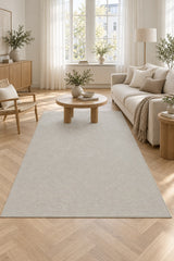 Looped Modern Area Rug – White in a living room