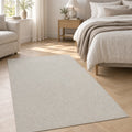Looped Modern Area Rug – White in a bedroom