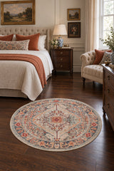 Medallion Modern Round Area Rug – Brown in a bedroom