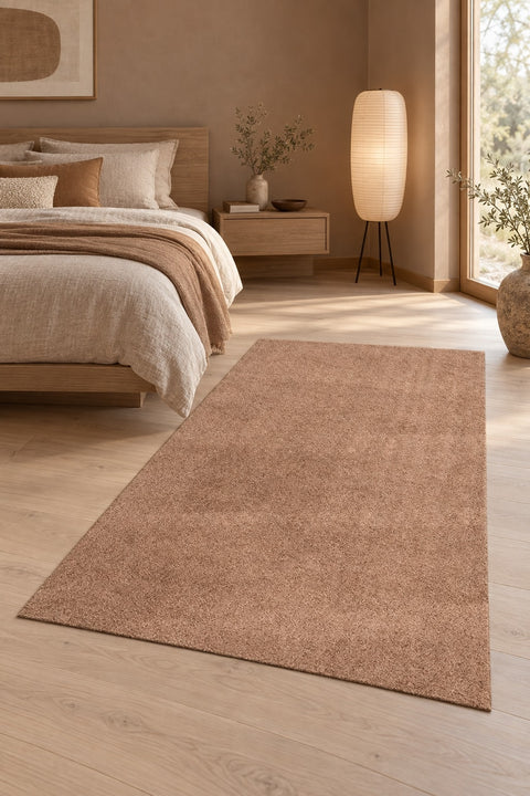 Mest Modern Plush Area Rug – Brown in a bedroom