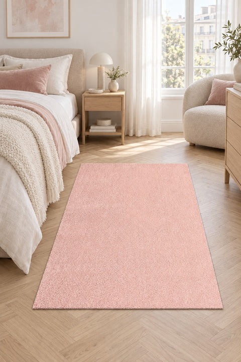 Mest Modern Plush Area Rug – Pink in a bedroom