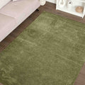 Moreno Modern Kitchen Rug – Green in a living room