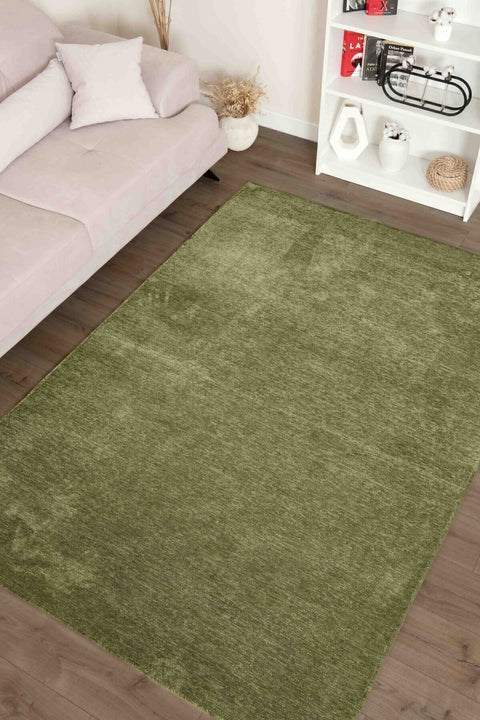 Moreno Modern Kitchen Rug – Green in a living room