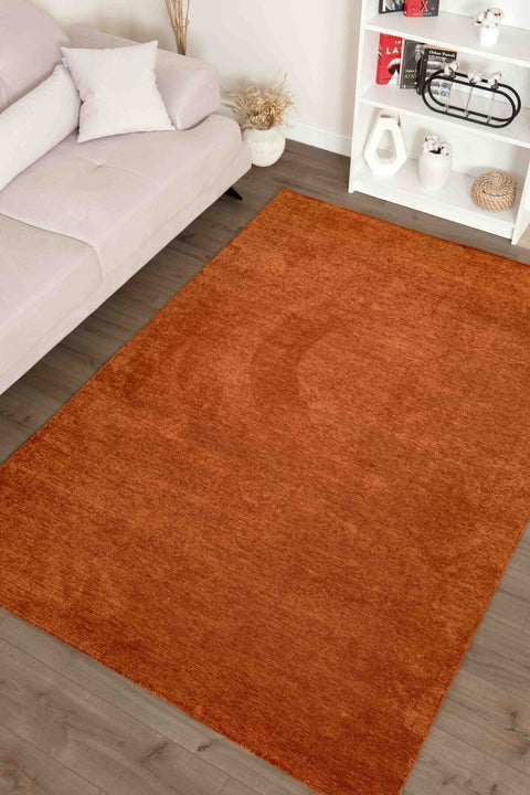 Moreno Modern Kitchen Rug – Terracotta in a living room