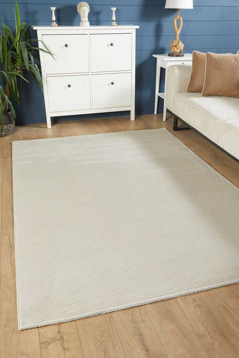 Mystic Modern Area Rug – Cream in a living room