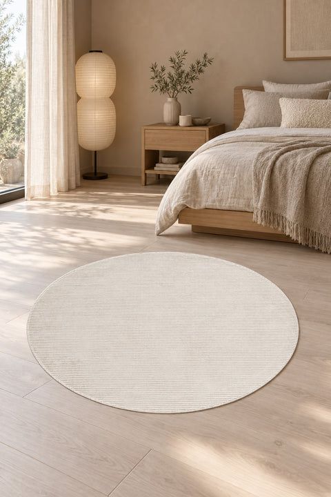 Mystic Modern Area Rug – Light Beige in a bedroom