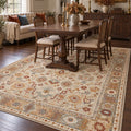 Oriens Ethnic Area Rug – Beige in a dining room