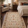 Oriens Ethnic Area Rug – Beige in a bedroom