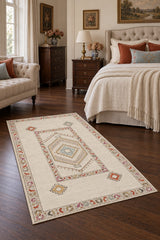 Oriens Ethnic Area Rug – Cream in a bedroom
