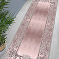 Ornate Geometric Modern Runner Rug – Pink in a hallway