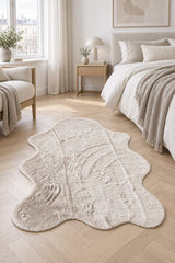 Plush Shag Kids Oval Rug – Beige in a bedroom
