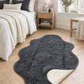 Plush Shag Kids Oval Rug – Charcoal in a bedroom