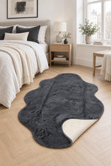 Plush Shag Kids Oval Rug – Charcoal in a bedroom