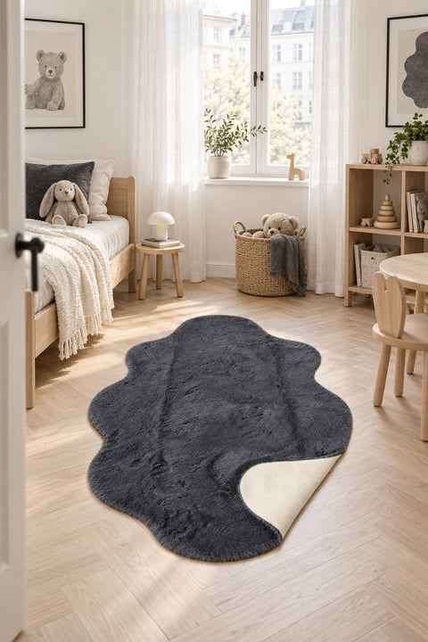 Plush Shag Kids Oval Rug – Charcoal in a nursery