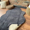 Plush Shag Kids Oval Rug – Charcoal in a living room