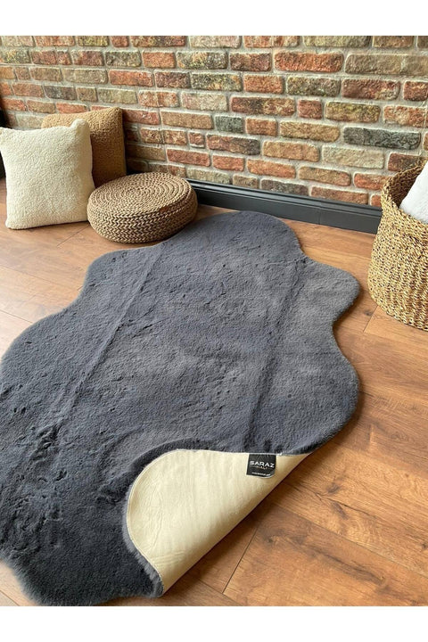 Plush Shag Kids Oval Rug – Charcoal in a living room
