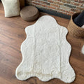 Plush Shag Kids Oval Rug – Cream in a living room