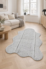 Plush Shag Kids Oval Rug – Gray in a living room