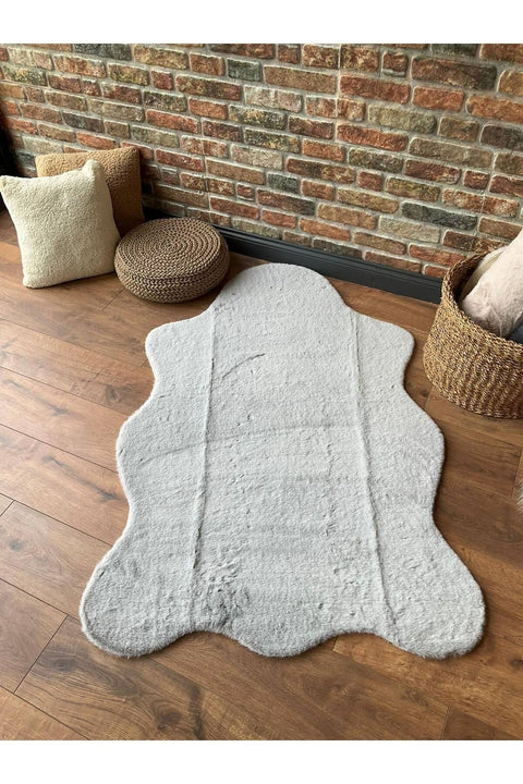 Plush Shag Kids Oval Rug – Gray in a living room