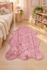Plush Shag Kids Oval Rug – Pink in a nursery