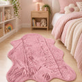Plush Shag Kids Oval Rug – Pink in a bedroom