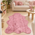 Plush Shag Kids Oval Rug – Pink in a living room