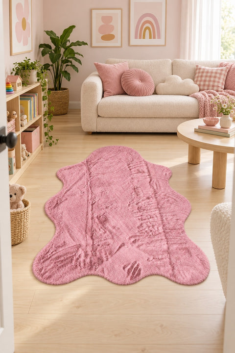 Plush Shag Kids Oval Rug – Pink in a living room