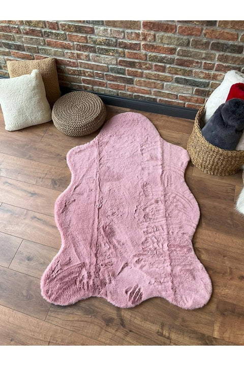 Plush Shag Kids Oval Rug – Pink in a living room