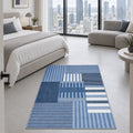 Printed Modern Area Rug – Blue in a bedroom