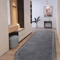 Puffy Geometric Boho Oval Rug – Charcoal in a hallway