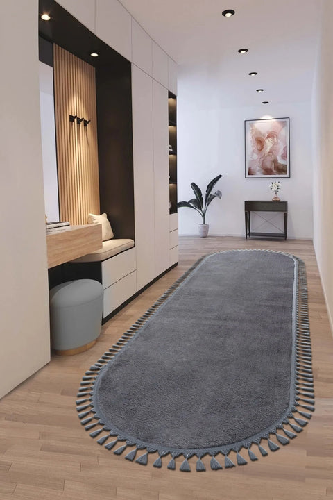 Puffy Geometric Boho Oval Rug – Charcoal in a hallway