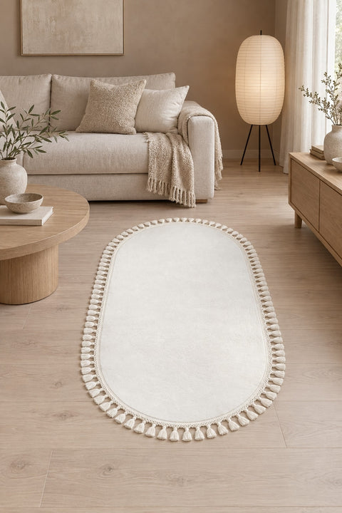 Puffy Geometric Boho Oval Rug – White in a living room