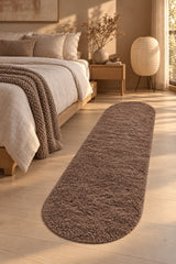 Puffy Plush Modern Oval Rug in a bedroom
