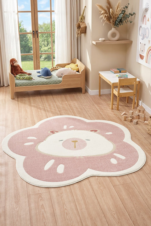 Quincey Kids Plush Area Rug – Pink & White in a nursery