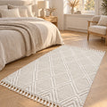 Quincey Modern Shag Area Rug – Cream in a bedroom