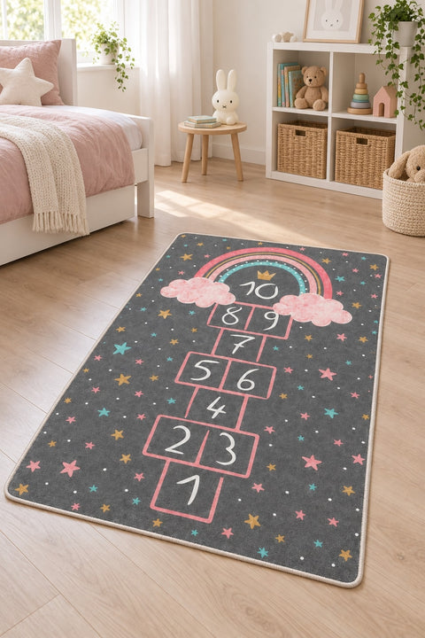 Rainbow Hopscotch Kids Area Rug in a nursery